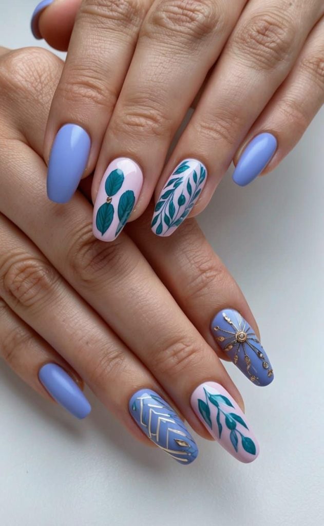 Periwinkle nails with leafy designs on pale pink accent nails