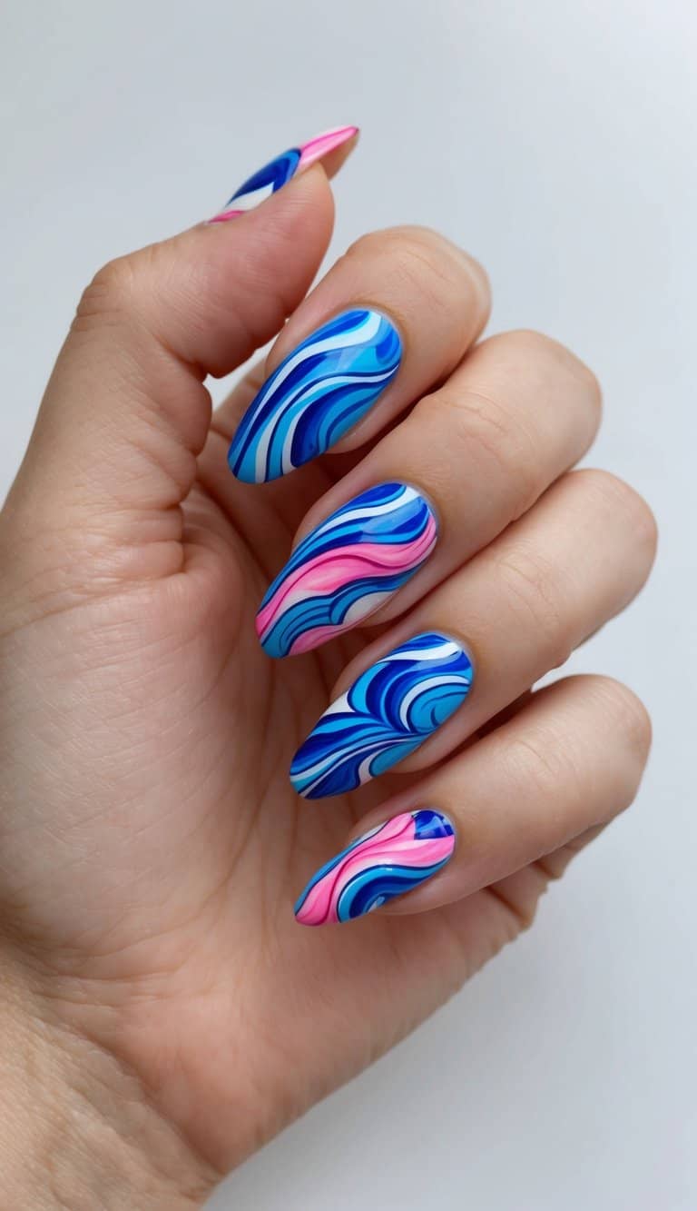 A dreamy, ocean-inspired manicure with flowing blue and pink wave designs