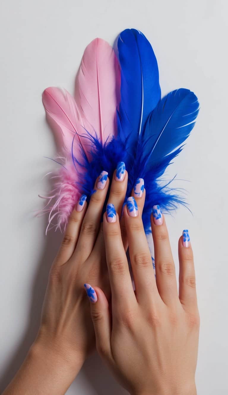 Soft pink nails with bold, bright blue abstract designs for a striking contrast that’s both modern and artistic