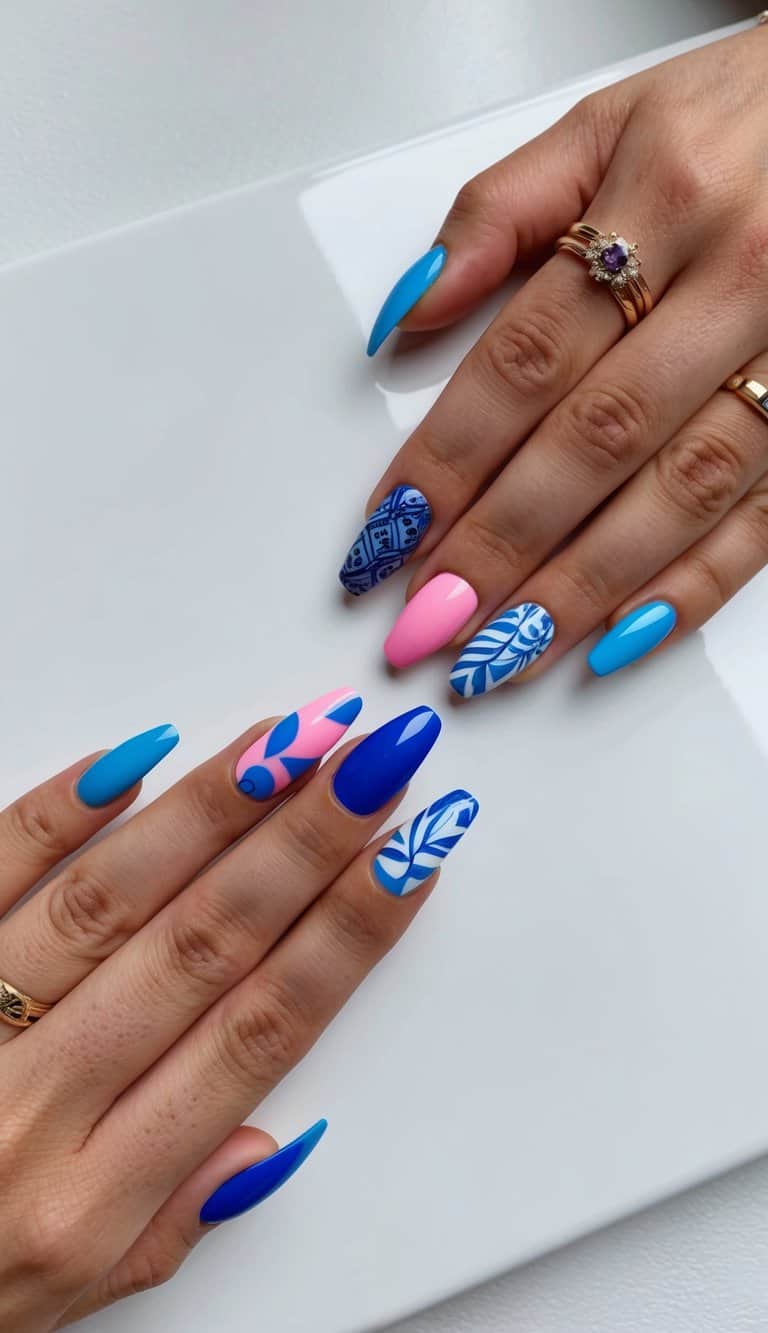 Vibrant blue and pink nail art designs displayed on a clean, white surface with various patterns and styles