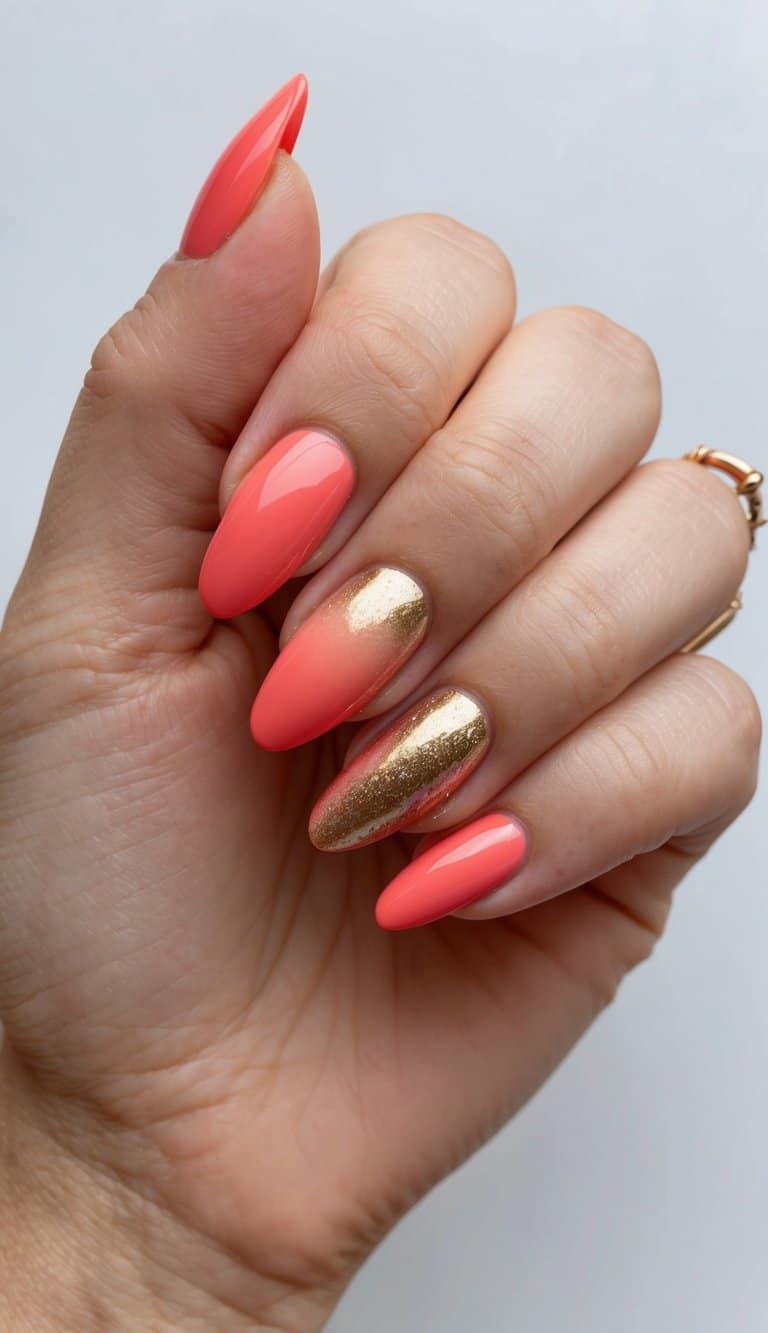 A tropical coral and gold gradient nail art design with vibrant and fresh colors