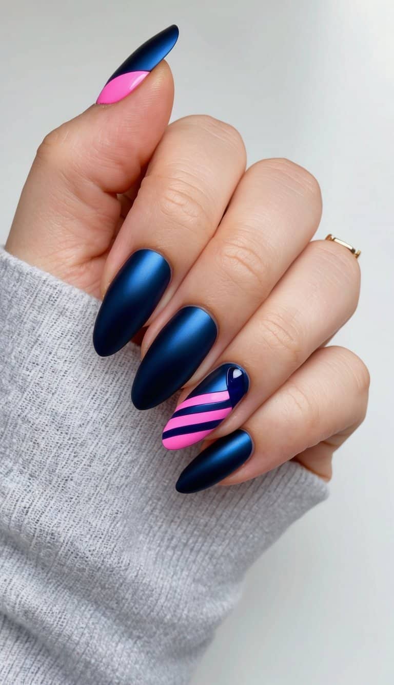 A navy color block with pink accents, featuring metallic navy blue nail art designs