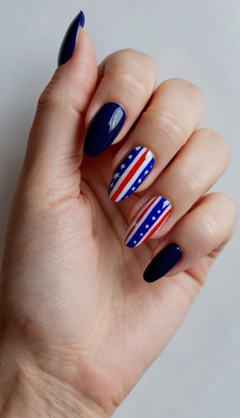 A festive nail art design with navy blue accents and patriotic Fourth of July themes