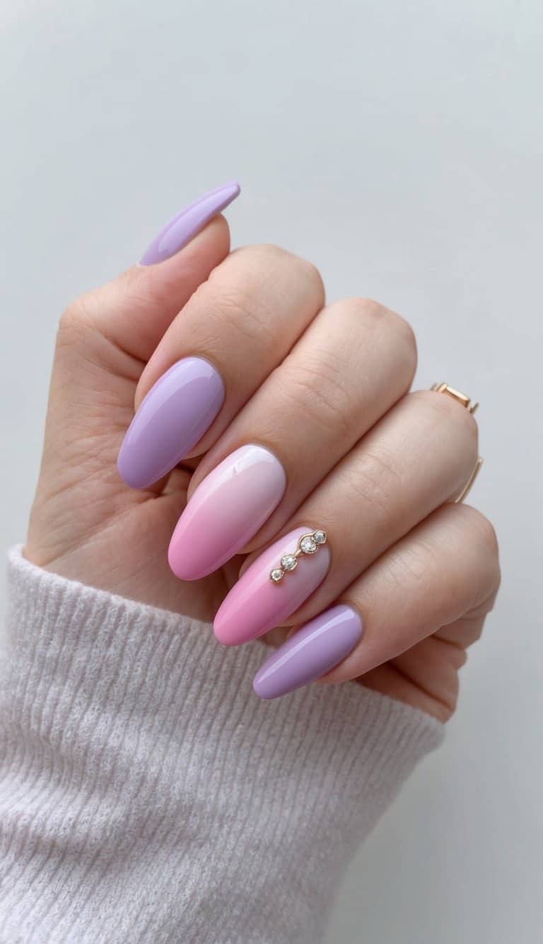 Soft lilac and pink ombre nails, with a gradient of delicate pink hues