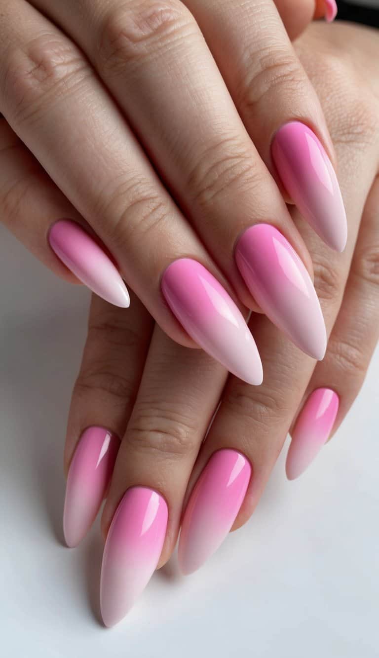A set of pink ombre nails with a soft gradient and smokey effect