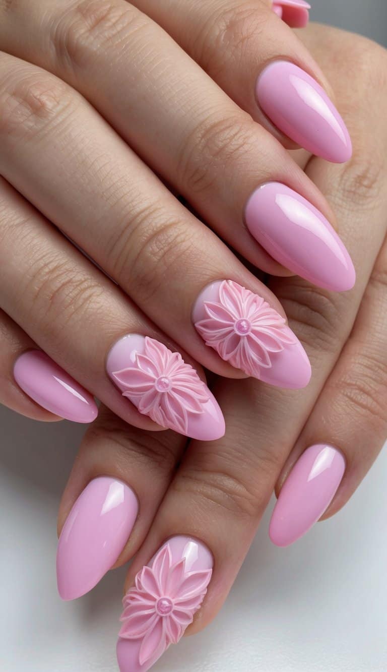 A close-up of pink ombre nails adorned with intricate and delicate pink flower designs