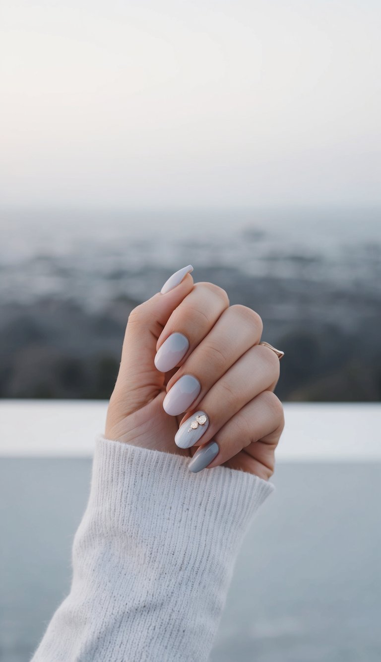 A gradient of hazy gray hues fading into the horizon, creating a serene and elegant backdrop for nail art