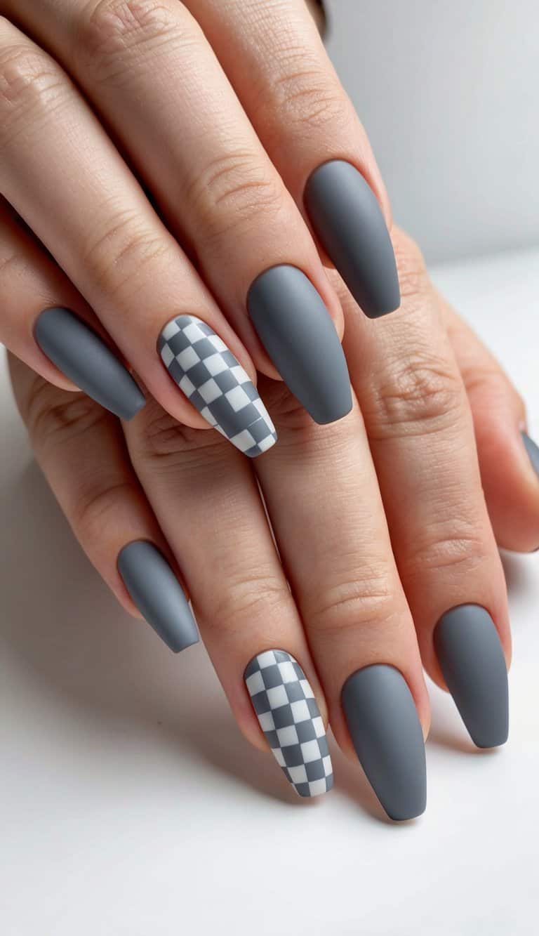 A checkerboard pattern of sleek matte gray nail art designs