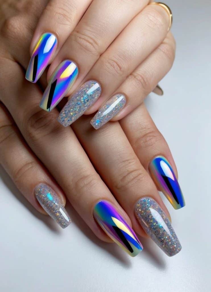 A holographic glitter tips abstract nail art design with bold shapes and vibrant colors