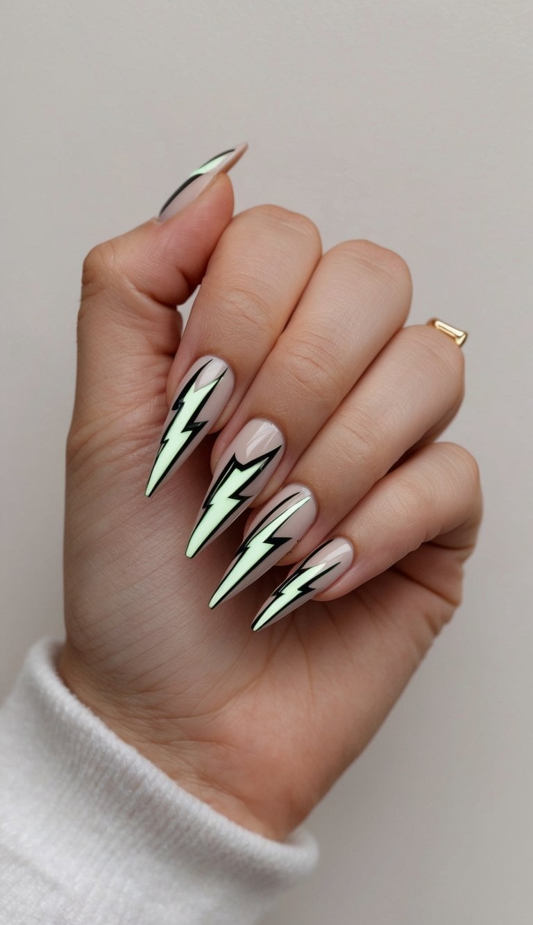 A close-up of edgy lightning bolt nail art designs on a neutral background