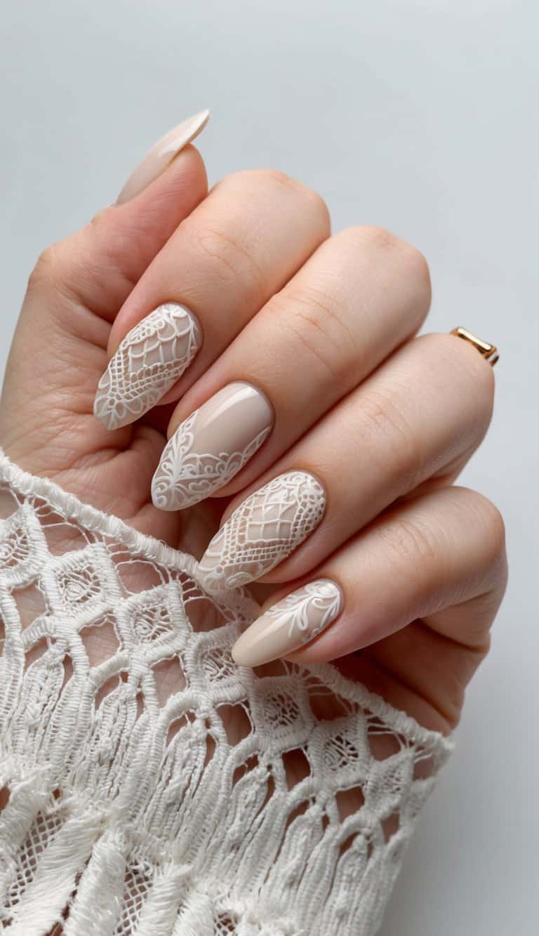 A vintage lace-inspired nail art design in neutral tones, featuring delicate patterns and elegant details