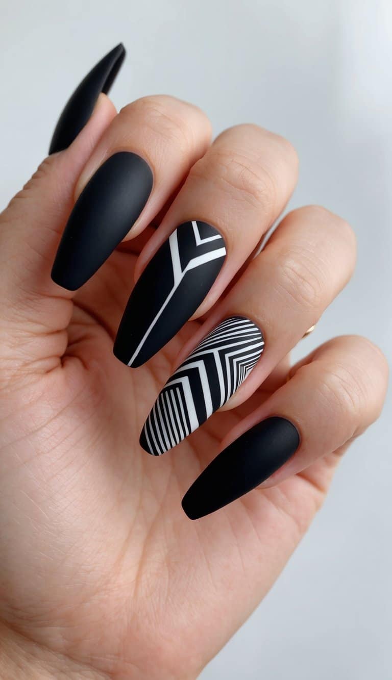 A sleek and modern nail art design featuring matte black polish with bold and edgy geometric patterns and intricate details