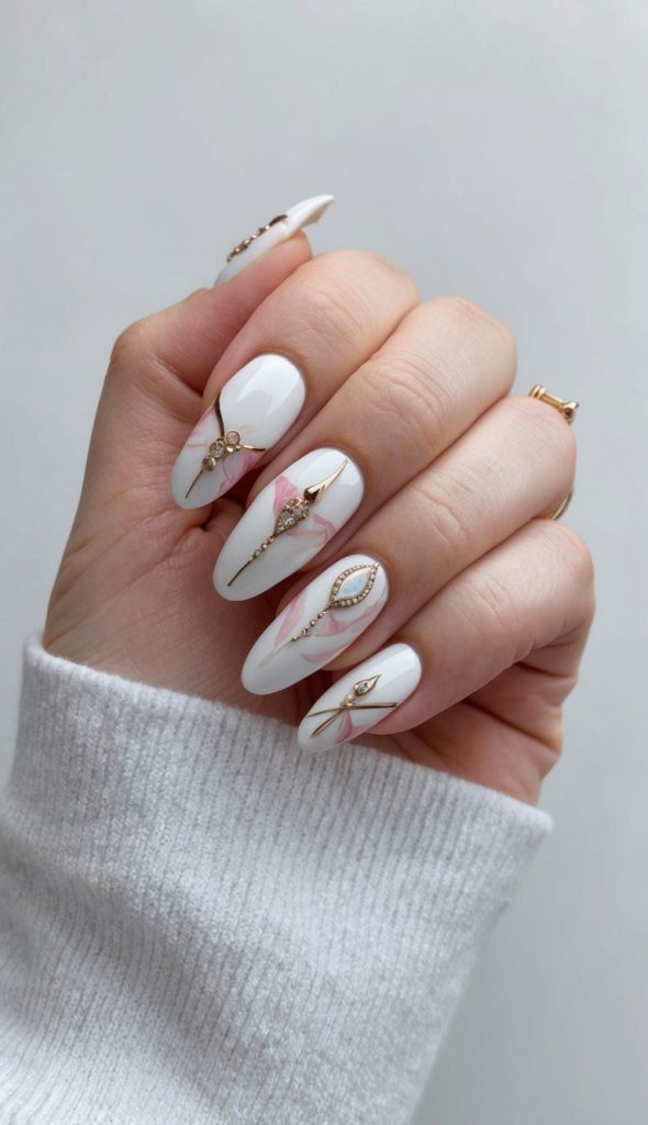A trendy formal nail design featuring a glossy white base, intricate gold embellishments, and soft pink details, adding a touch of glamour and sophistication.