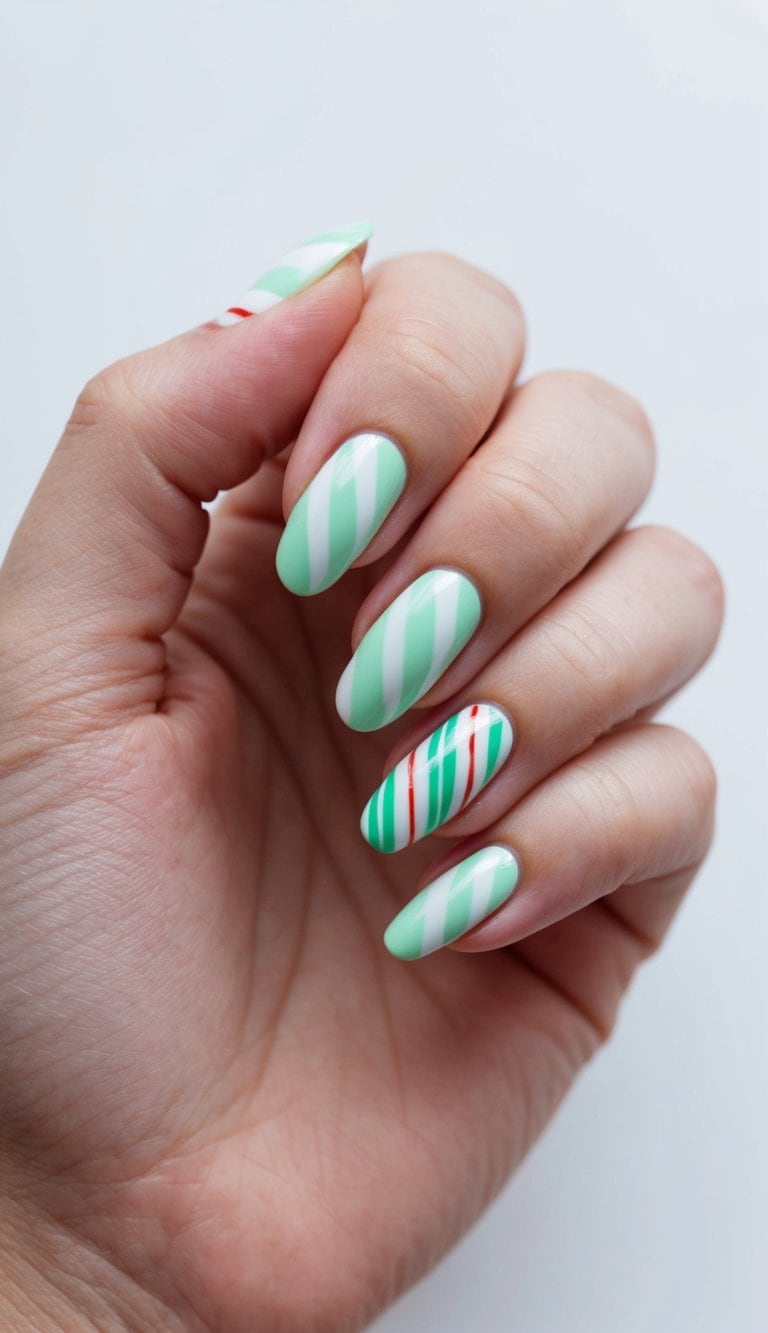 A close-up of mint green candy cane stripes on nails