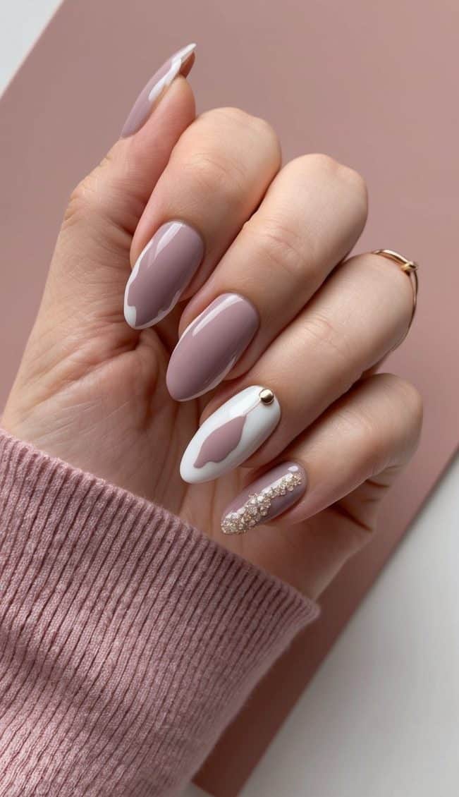 A collection of mauve nail art designs with scalloped edges displayed on a soft, dusty pink background