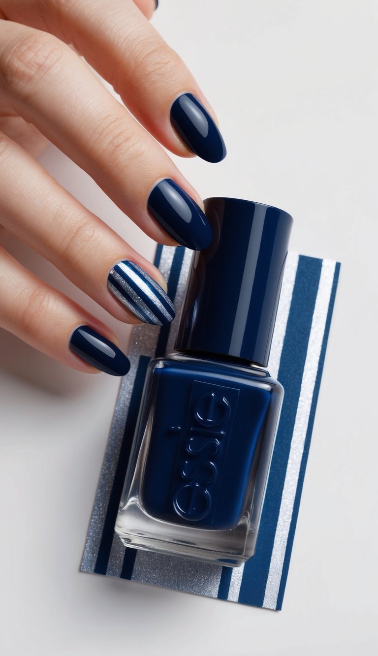 A sleek navy blue nail polish bottle surrounded by deep blue and silver stripes