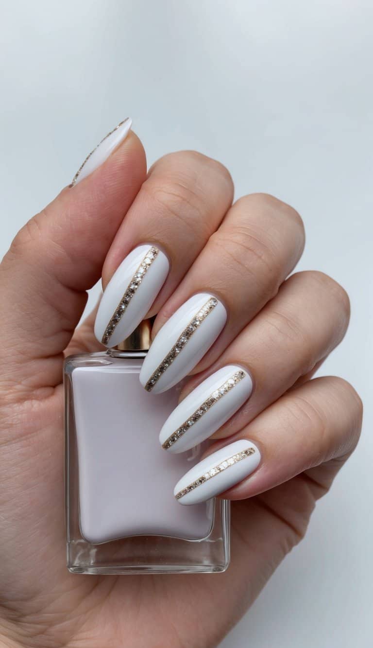 A French-inspired nail art design with elegant lines and glitter accents