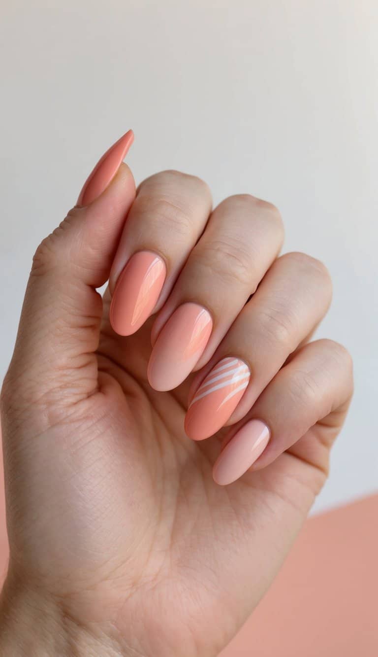 A peach and coral gradient nail art design with soft and sweet elements