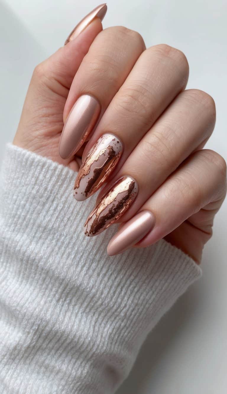 Rose gold splashes on a chic and luxurious nail art design