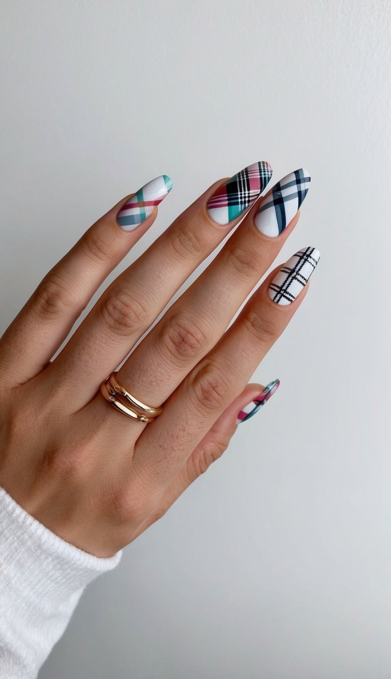 A close-up of plaid patterned nails in various colors with a clean and minimalist background