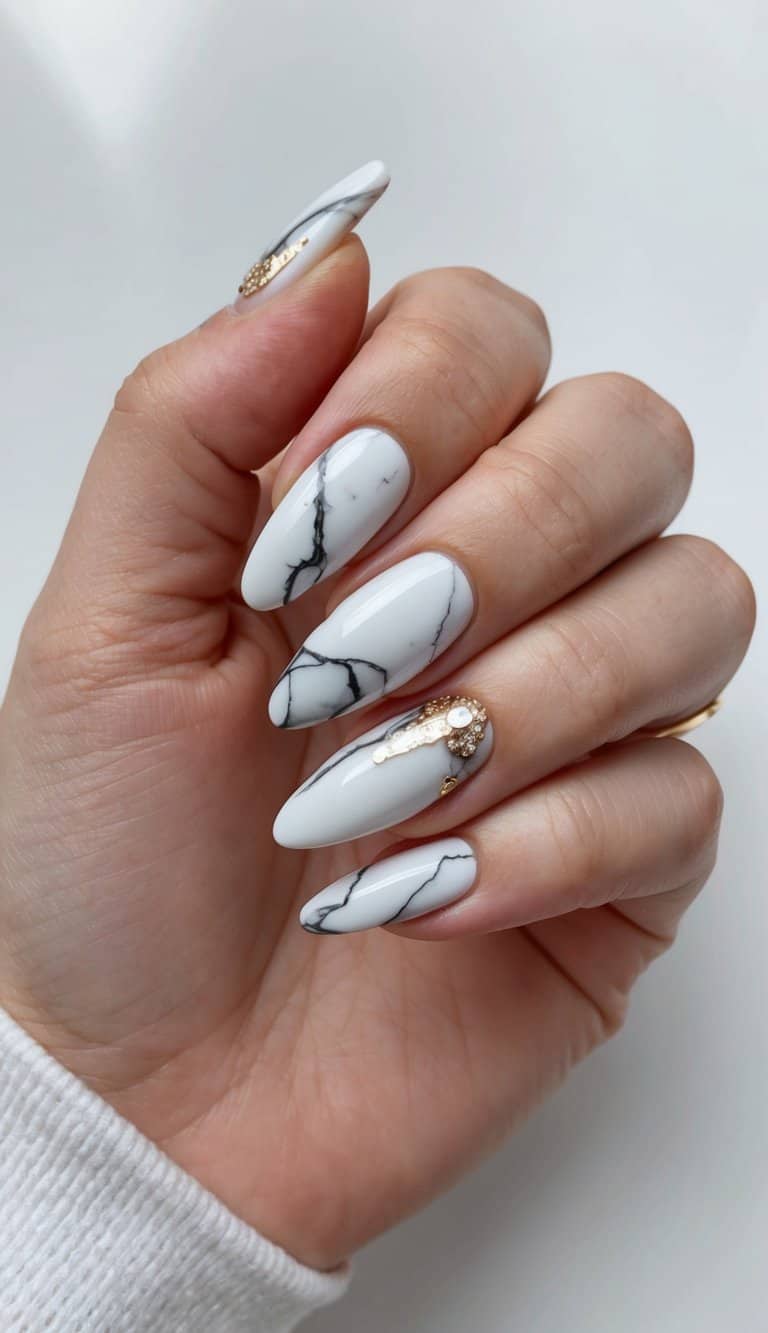 A sleek marble nail design with sophisticated and minimalistic elements