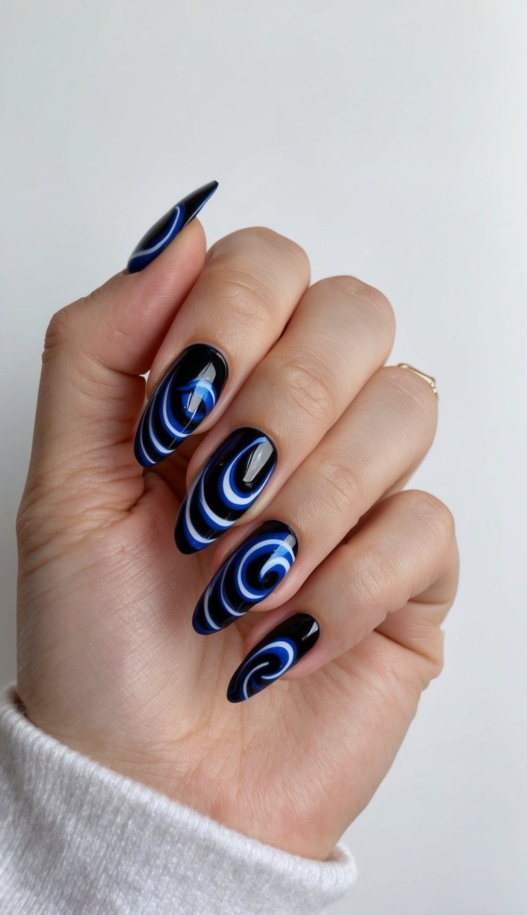 A sleek, glossy nail adorned with swirling black and blue designs