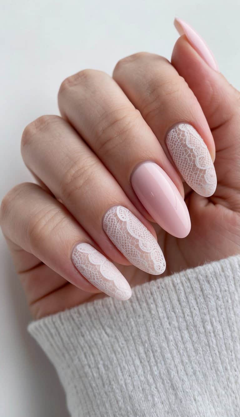 Soft pink nails adorned with delicate lace patterns