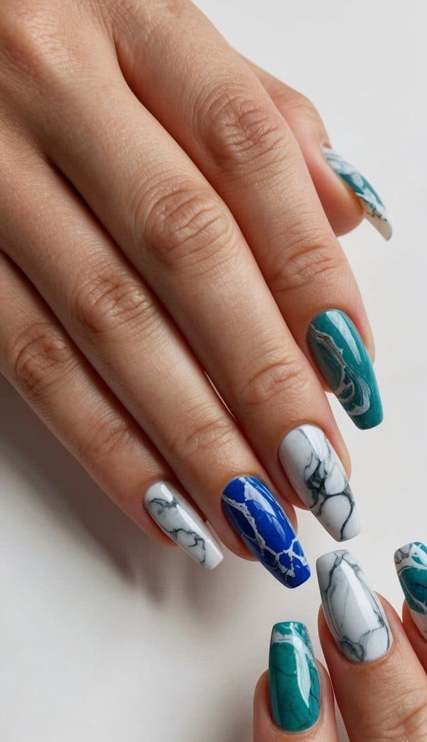A vibrant array of marbled stone-inspired nail art designs displayed on a clean, neutral background