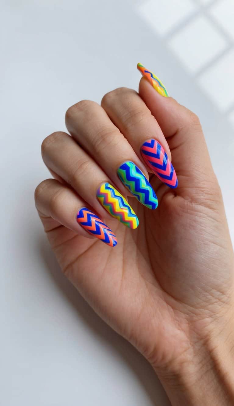 A close-up view of vibrant, zig-zag patterned nails in various colors and designs