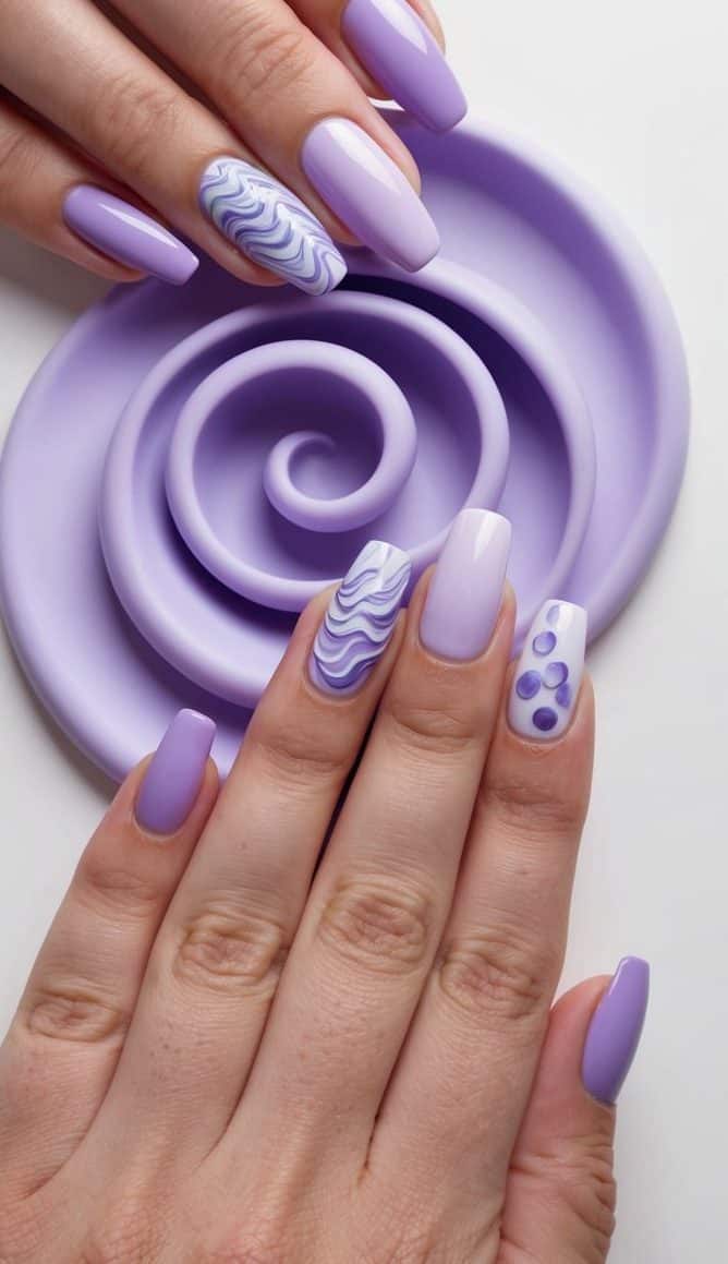 Pastel purple waves swirling around various nail art designs