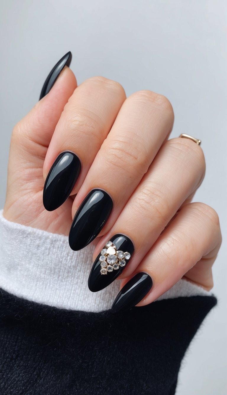 Jet-black nails with a single accent nail adorned in rhinestones and pearls for a glam-meets-emo vibe.