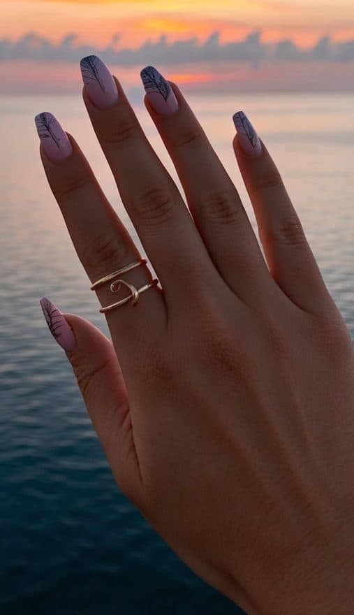 A serene sunset over a calm ocean, with the sky transitioning from warm oranges and pinks to cool purples and blues