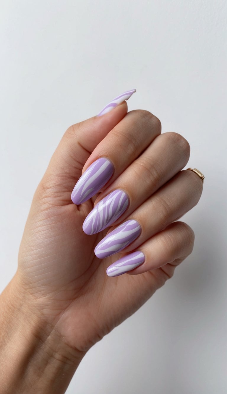 A lavender zebra print nail art design with soft elegance