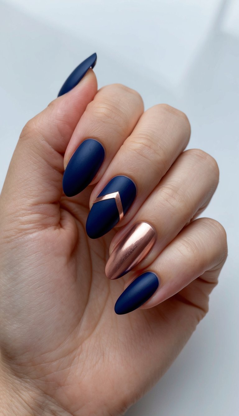 A navy and rose gold geometric nail art design with bold and classic style