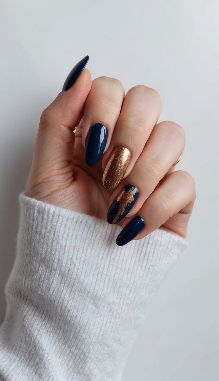 A navy and bronze color splash nail art design with bold and classic style