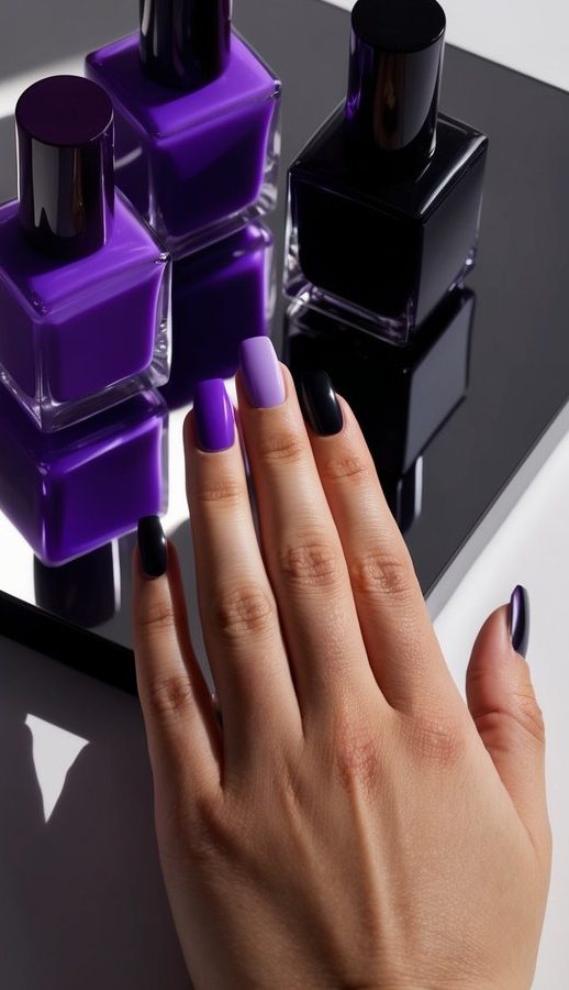 Purple and black nail polish bottles arranged on a reflective surface, with dramatic lighting casting shadows