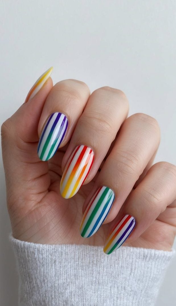 Rainbow stripes on a set of elegant nails