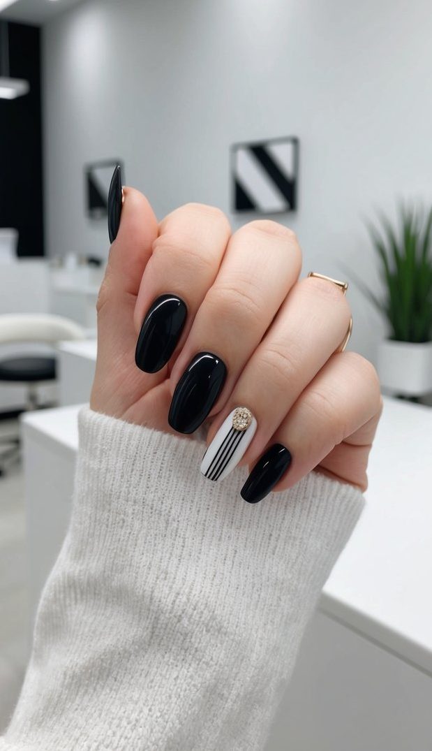 A clean, modern nail salon with minimalistic decor and a sleek black and white color scheme