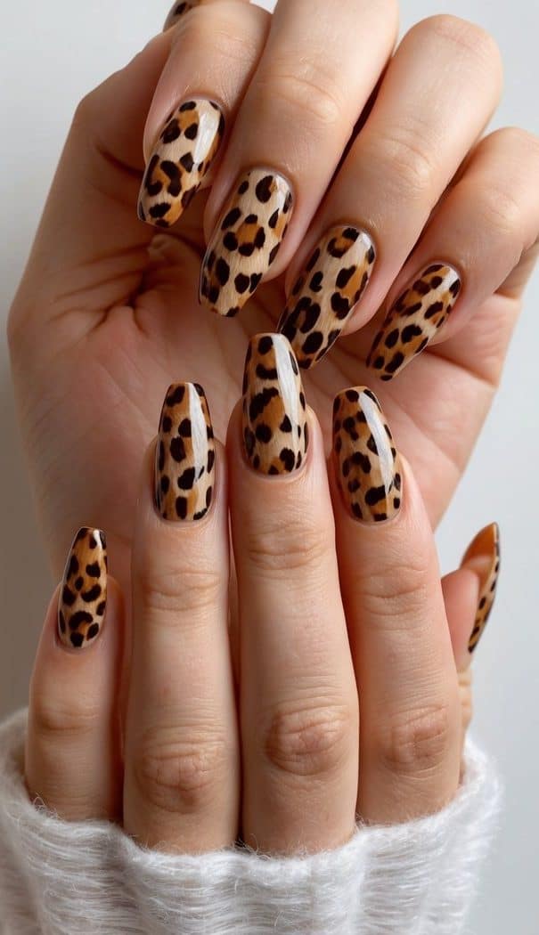A leopard print design in warm brown tones for nail art inspiration