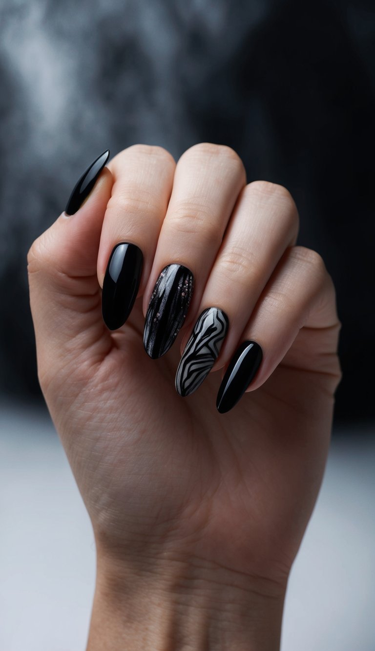 Glossy black nails paired with a glittery black accent and one gray nail with a zebra-like swirl pattern.