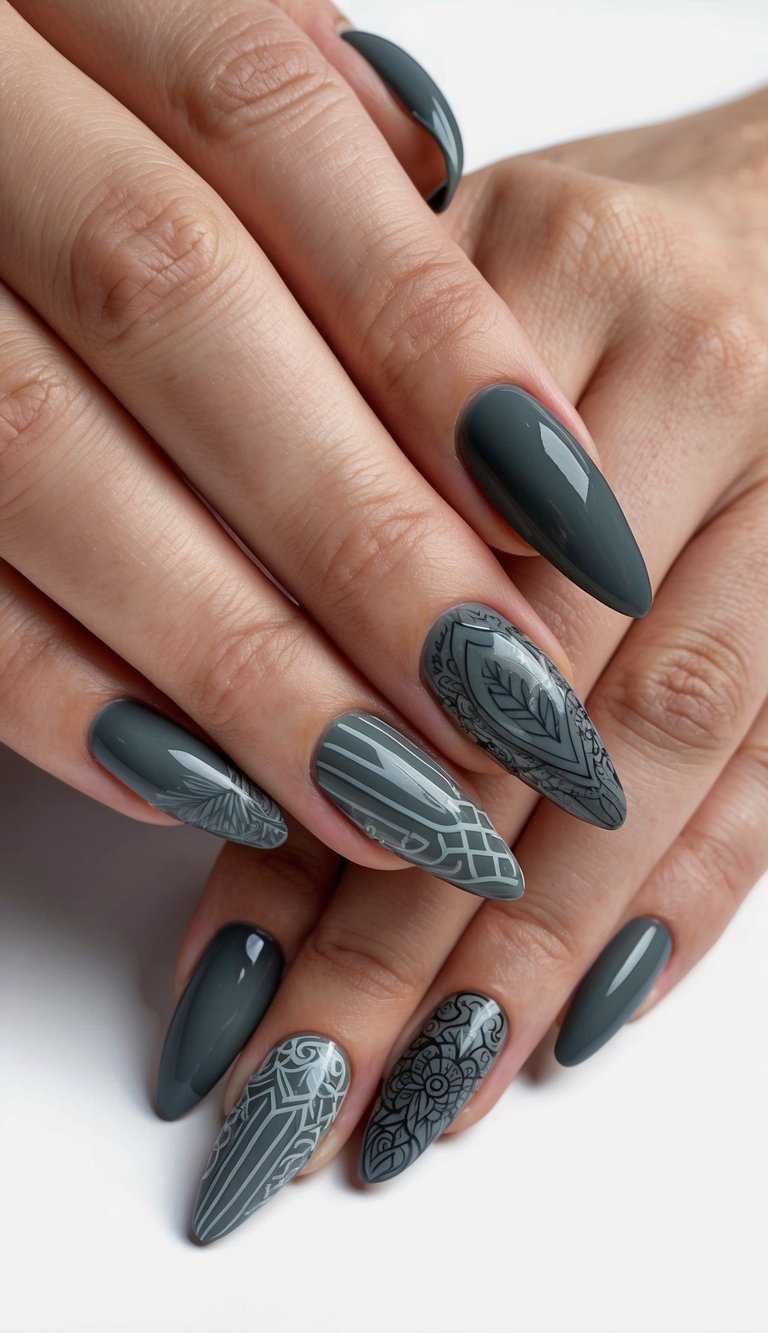 A close-up of charcoal gray nails with various intricate designs and patterns