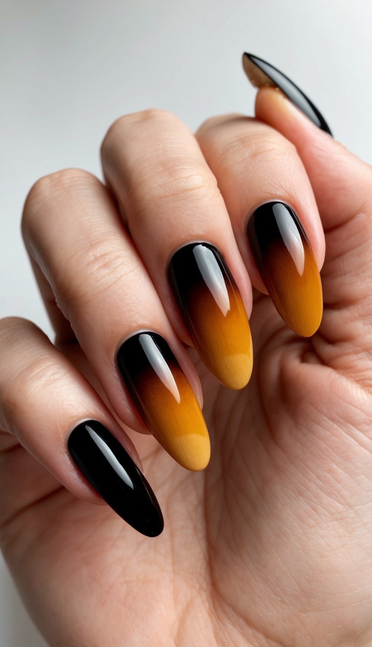 Glossy almond nails fading from golden yellow to black, styled in a curled hand pose against a softly lit white background.