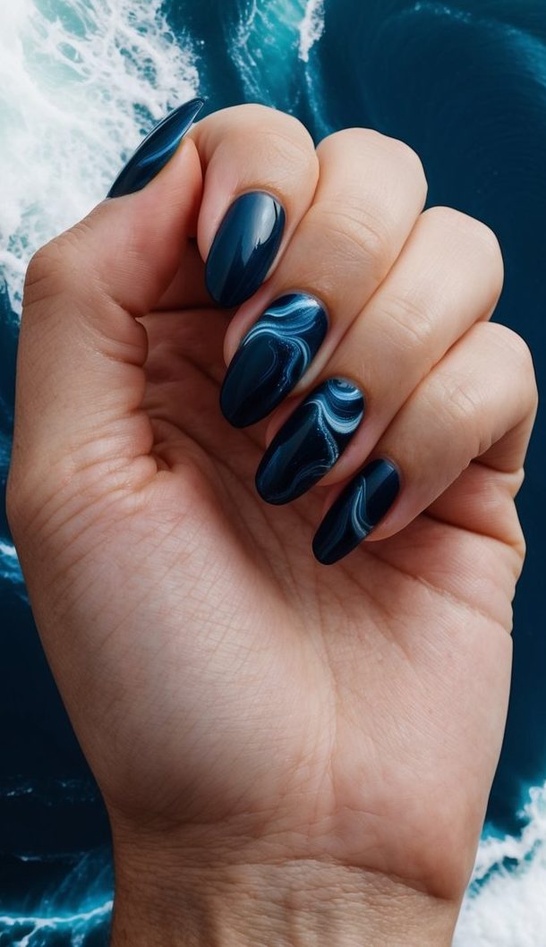 A deep ocean current swirls with dark midnight navy blue tones