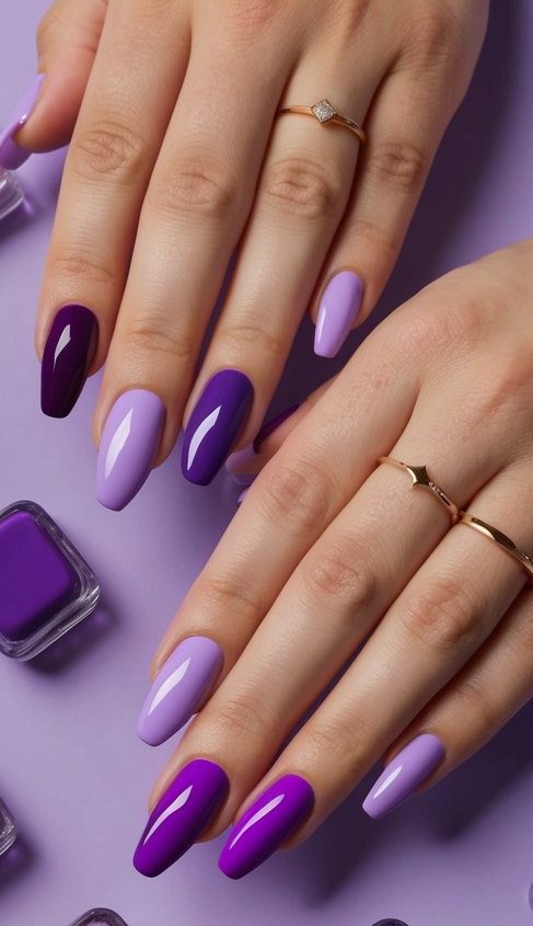 A periwinkle background with 50 shades of purple nail polish arranged in an elegant and artistic display