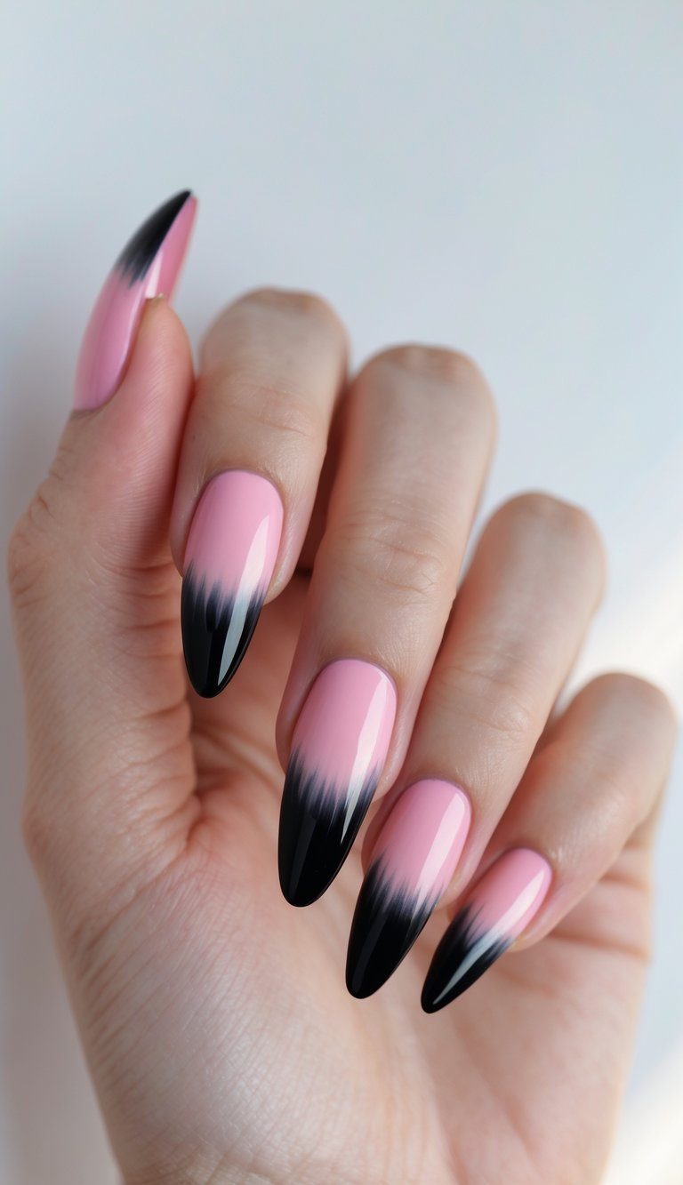 Fading from pink to black tips, these nails blend sophistication with drama.