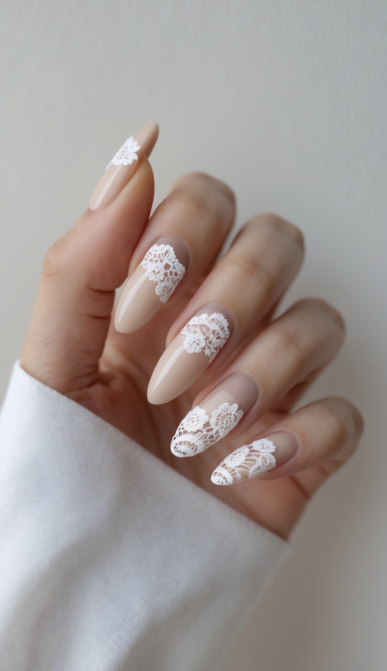 A minimalist hand flaunts long nude nails topped with refined white lace detailing. This delicate nail art idea proves that soft design can make a bold, stylish statement.
