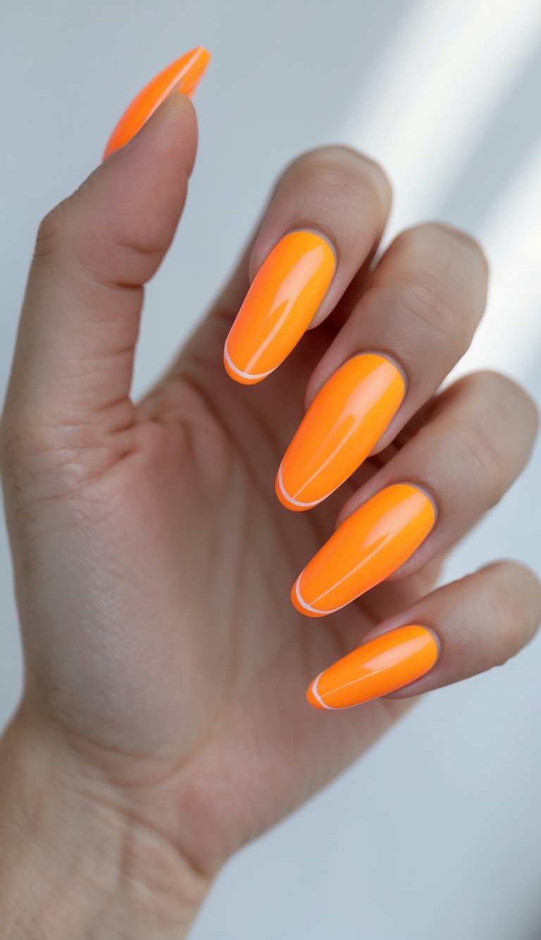 Close detail of vivid orange manicure with thin white French edging, high-shine surface, clean lines, and a colored French nail art idea aesthetic.