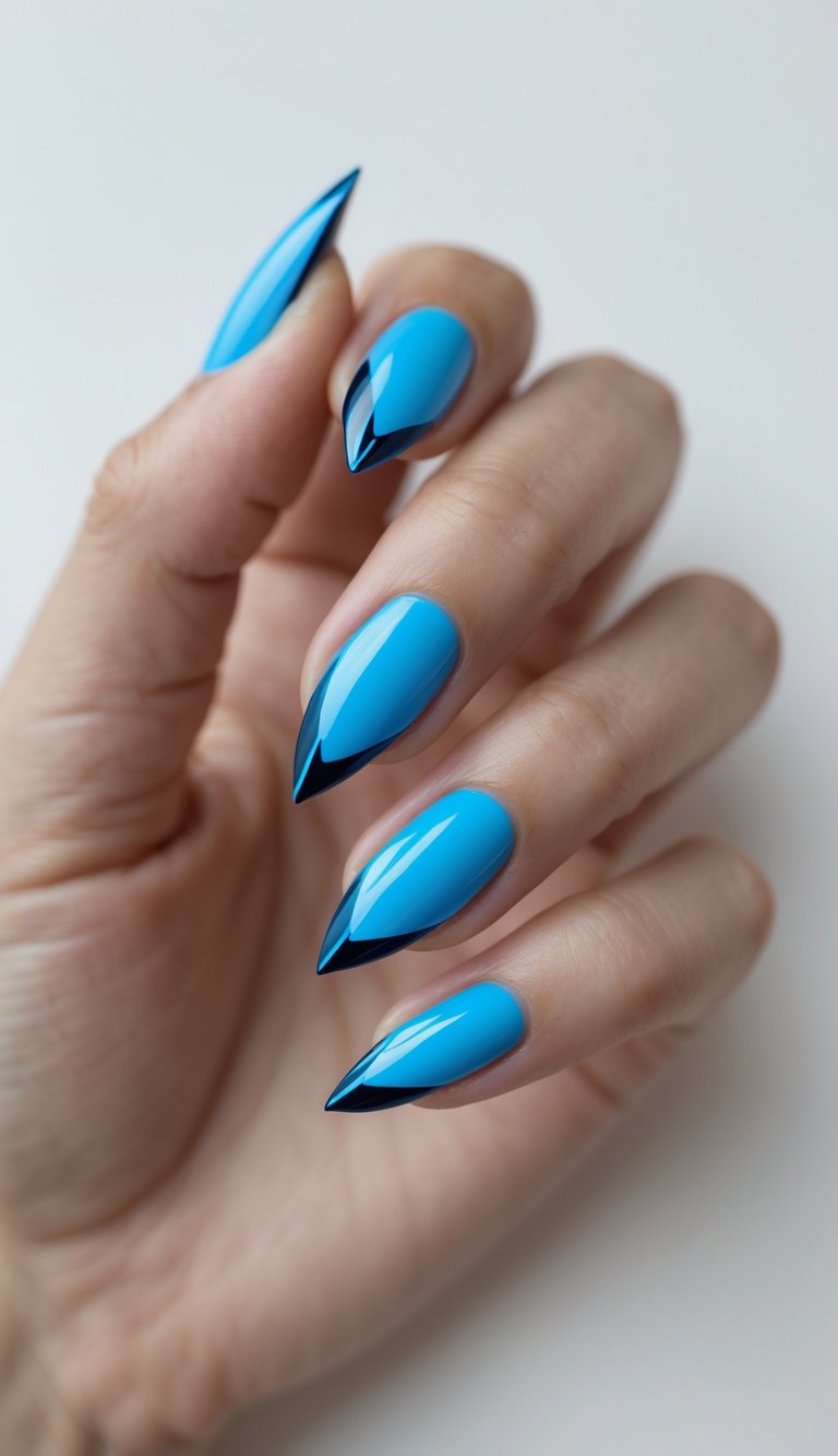 Close-up of one hand with sharp almond-shaped nails featuring electric blue French tips against a white background