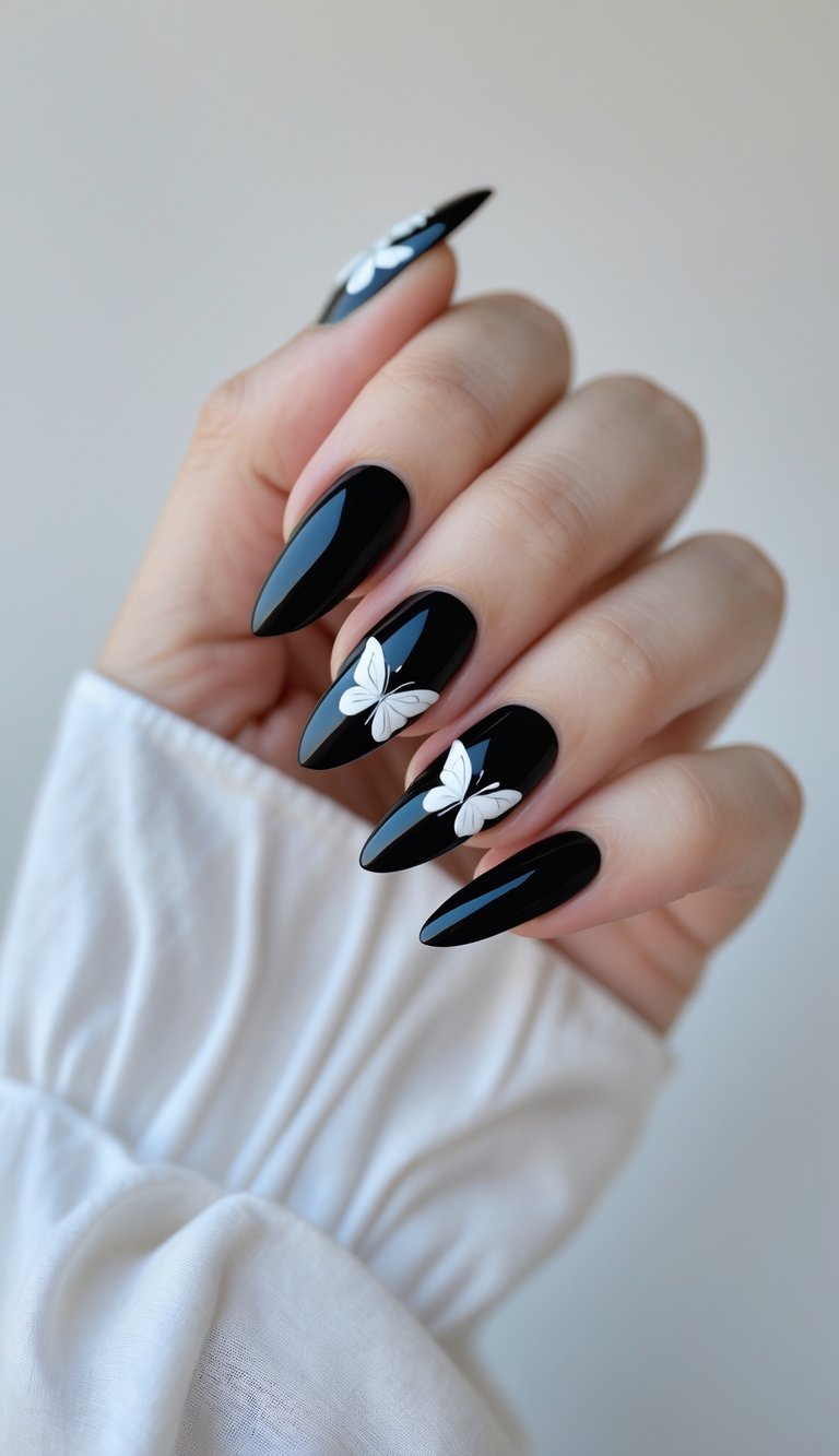 Elegant black manicure with smooth finish and white 3D butterflies showcasing a dramatic butterfly nail art idea.