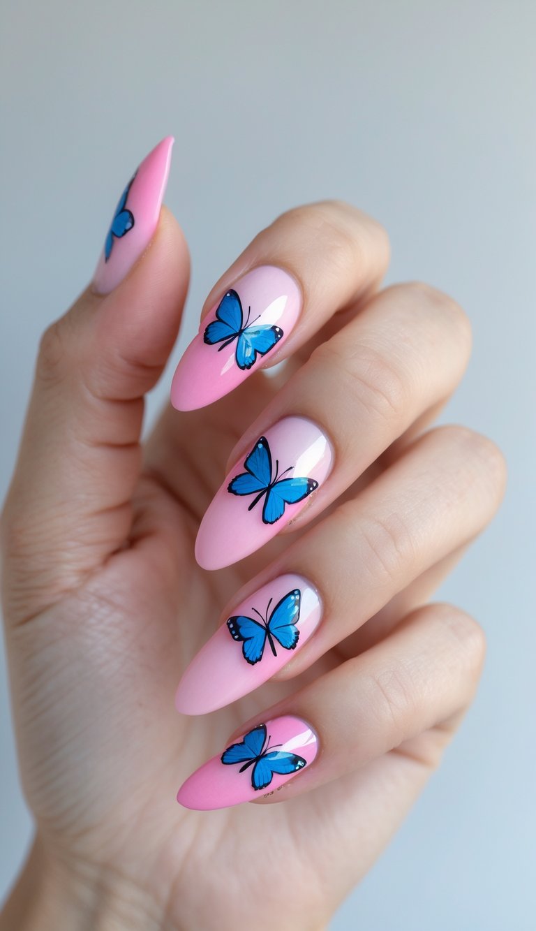 Gradient pink nails with realistic blue butterfly decals, evoking a delicate and feminine butterfly nail art idea.